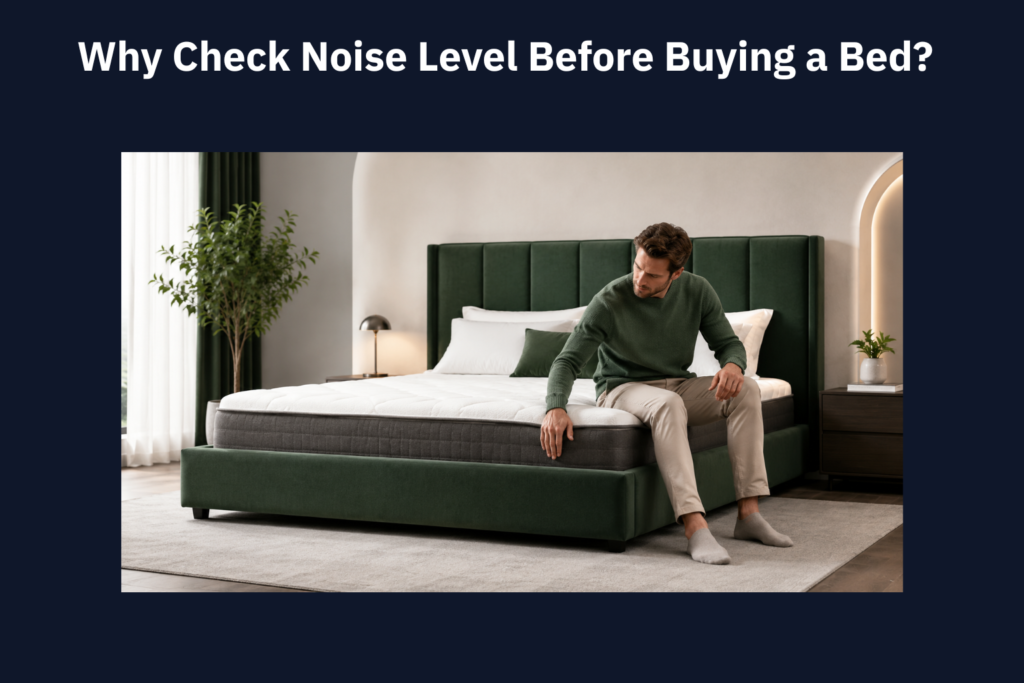 Man checking a bed frame for noise level while sitting on a mattress in a modern bedroom.
